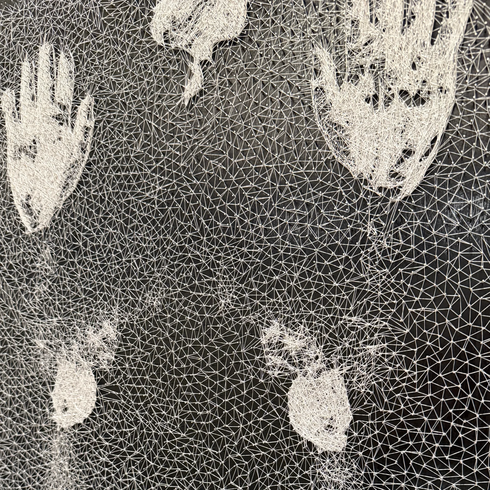 Mark of Faith thread and nails artwork by Dr. Bilal Hassam